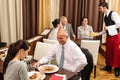 Business lunch restaurant people eating meal Royalty Free Stock Photo