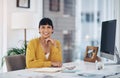 Business magic happens here. Cropped portrait of an attractive young businesswoman sitting alone in her office with her