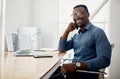 Business magic happens here. Cropped portrait of a handsome young businessman sitting alone in his office during the day