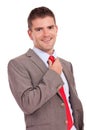 Business man adjusting his tie Royalty Free Stock Photo