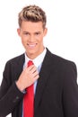 Business man adjusting his tie Royalty Free Stock Photo