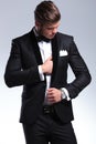 Business man adjusting suit Royalty Free Stock Photo