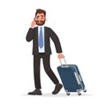 Business man at the airport with luggage is talking on the phone Royalty Free Stock Photo