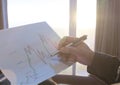 ibonacci indicator analysis concept, Business man analyzing stock graph chart