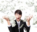 Business man anger shouting with money rain