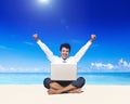 Business man on beach with laptop Royalty Free Stock Photo