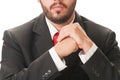 Business man with beard, black suit and red tie