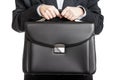 Businessman hand holding briefcase Royalty Free Stock Photo