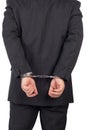 Business man with a black suit in handcuffs Royalty Free Stock Photo
