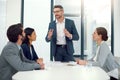 Business, man and boardroom with meeting for teamwork, collaboration and feedback on company growth as leader. Ceo, boss Royalty Free Stock Photo
