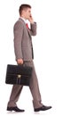 Business man with briefcase on the phone Royalty Free Stock Photo