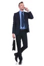 Business man with briefcase on the phone Royalty Free Stock Photo