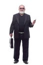 business man with a briefcase is talking on a mobile phone . Royalty Free Stock Photo