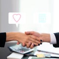 Business man and business woman are shaking hands after finishing up meeting. Happy ending to deal a business together. Enjoy with Royalty Free Stock Photo