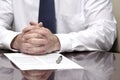 Business Man Businessman at Desk with Contract Making Hand Gestures