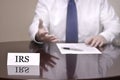 Business Man Businessman at Desk with Papers and Card Making Han