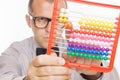 Business man calculating on abacus calculator Royalty Free Stock Photo