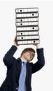 Business man carrying folders Royalty Free Stock Photo