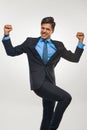 Business Man Celebrating Success against White Background