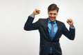 Business Man Celebrating Success against White Background