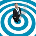 Business man in center of blue target Royalty Free Stock Photo