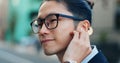 Business man, city and listening to music, digital podcast and streaming audio connection with earphones. Face, Japanese Royalty Free Stock Photo