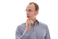 Business man with classes and a blue shirt is thinking about something - isolated Royalty Free Stock Photo