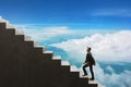 Business man climbing stairs in blue sky 3d illustrations Royalty Free Stock Photo