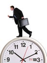 Business Man on Clock Royalty Free Stock Photo