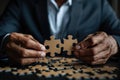 business man closeup Hands join puzzle pieces, putting the jigsaws team together. ai generated Royalty Free Stock Photo