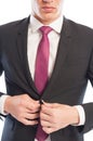 Business man closing his suit jacket Royalty Free Stock Photo