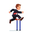 Business man competing in a steeplechase race Royalty Free Stock Photo