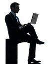 Business man computing laptop computer silhouette Royalty Free Stock Photo