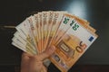 business man counting money. rich male hands holds and count cash banknotes of 50 euros bills or notes currency. Royalty Free Stock Photo