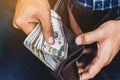 Close up Business man counting the money spread of cash in wallet. Royalty Free Stock Photo