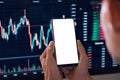 Crypto trader using phone white mockup screen cryptocurrency trading mobile app.