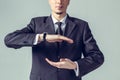 Business man with cupped hands Royalty Free Stock Photo