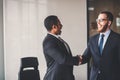 Two business men shaking hands in meeting. great deal concept Royalty Free Stock Photo