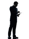 Business man digital pen stylus tablet silhouette Royalty Free Stock Photo