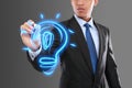 Business man drawing idea light bulb Royalty Free Stock Photo
