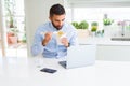 Business man eating asian food from delivery while working using computer laptop at the office Royalty Free Stock Photo