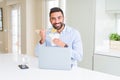 Business man eating asian food from delivery while working using computer laptop at the office Royalty Free Stock Photo