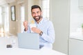 Business man eating asian food from delivery while working using computer laptop at the office Royalty Free Stock Photo