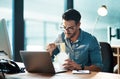 Business man eating lunch at his desk, reading an email on a laptop and working overtime in office. Corporate Royalty Free Stock Photo