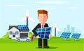 Business man employee of solar power plant and wind farm on background of clean energy powered household.