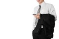 Business man employee in white t-shirt relaxing using smartphone,and holding black suit on his arm, isolated on white background Royalty Free Stock Photo