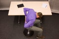 Business man exercising at desk at workplace Royalty Free Stock Photo