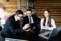 Business man explain his team all details of documents at office desk. Royalty Free Stock Photo