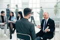 Business man explaining something to his colleague. Royalty Free Stock Photo