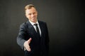 Business man with extended hand Royalty Free Stock Photo